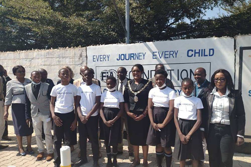 Mayor Mwaya with students from Chimwemwe Secondary School