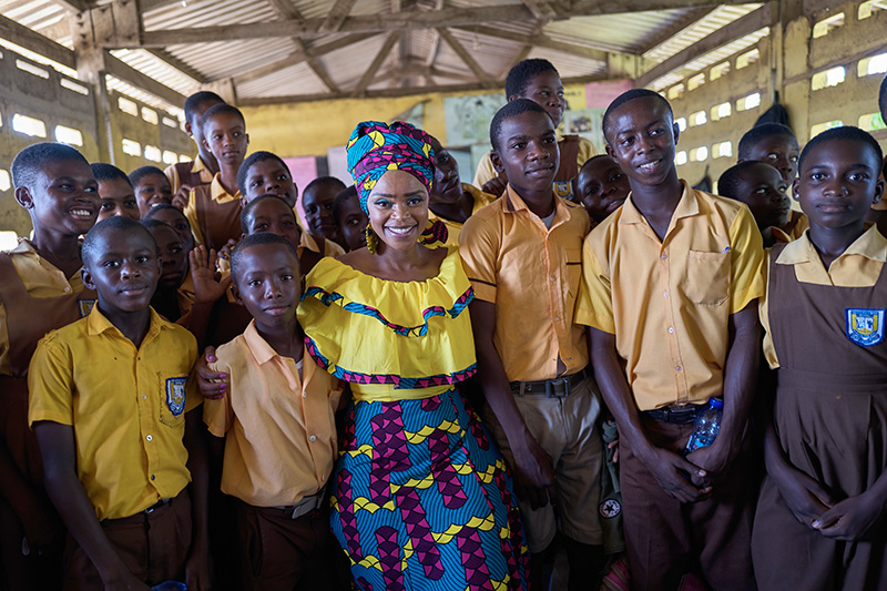 Zoleka Mandela with school children in Ghana, 2020.
